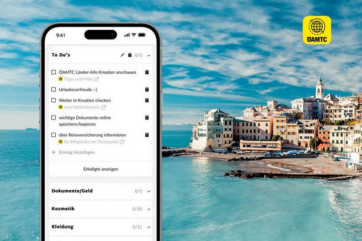 Eine Smartphone-Ansicht zeigt die Funktion "Reise Checkliste" der ÖAMTC-App mit dem Hintergrundbild von Santorin