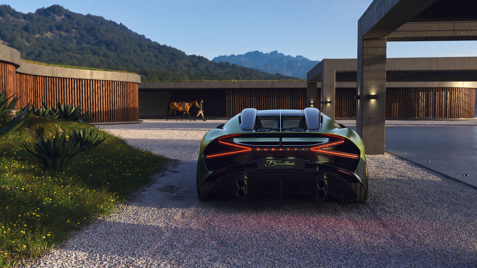 Ein grüner Bugatti von hinten fotografiert auf Schotter