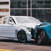 Ein weißes und ein blaues Auto nach einem Frontalzusammenstoß