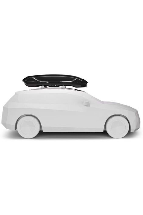 Seitenprofil eines weißen Modellautos auf dessen Dach eine schwarze Dachbox angebracht ist