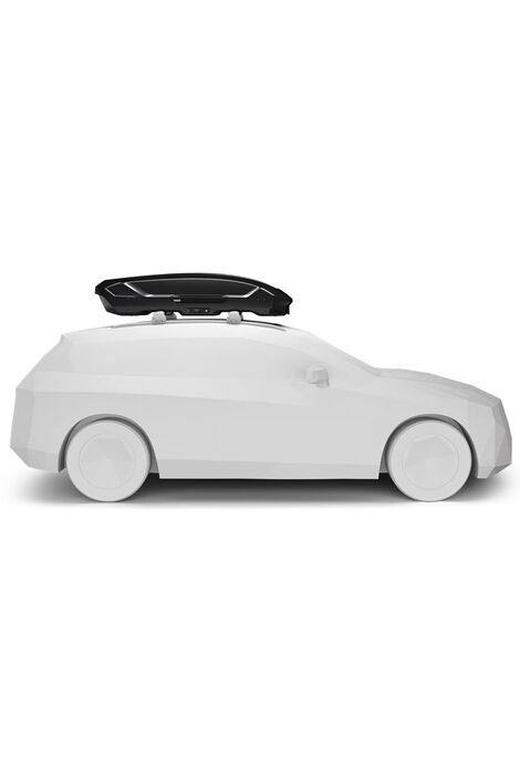 Seitenprofil  eines weißen Modellautos auf dessen Dach eine flache, schwarze Dachbox angebracht ist