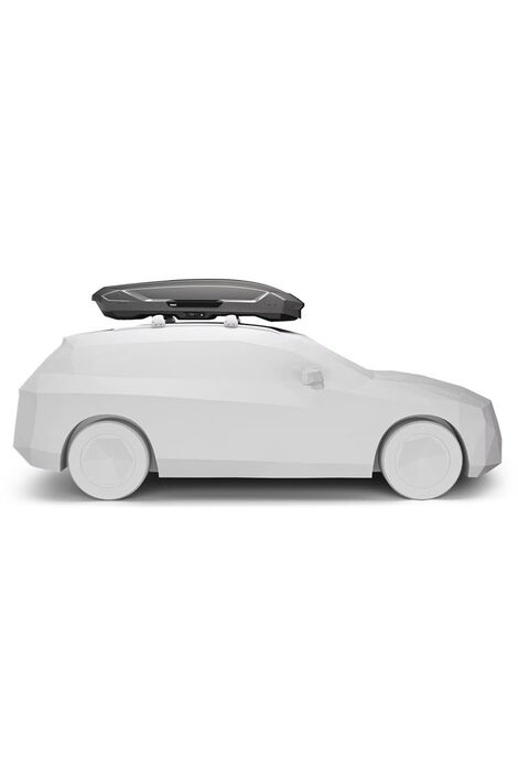 Seitenprofil  eines weißen Modellautos auf dessen Dach eine Titan-farbene Dachbox angebracht ist