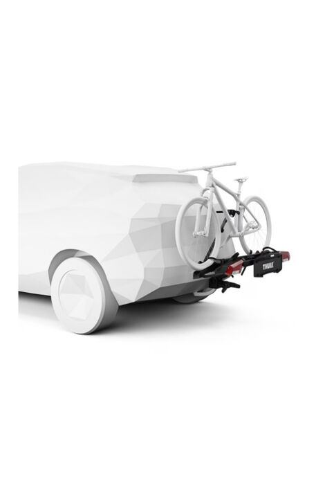 16989 Outpace 2er 2 g Modell eines weißen Autos an dem ein Fahrradträger montiert ist und ein weißes Fahrrad sichert.