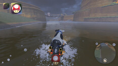 Screenshot aus Mario Kart World. Die Kuh raced über die Map Wildtierpark, die optisch wie eine Safari aussieht.