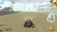 Screenshot aus Mario Kart World. Toadette ist im Rennen, es regnet.