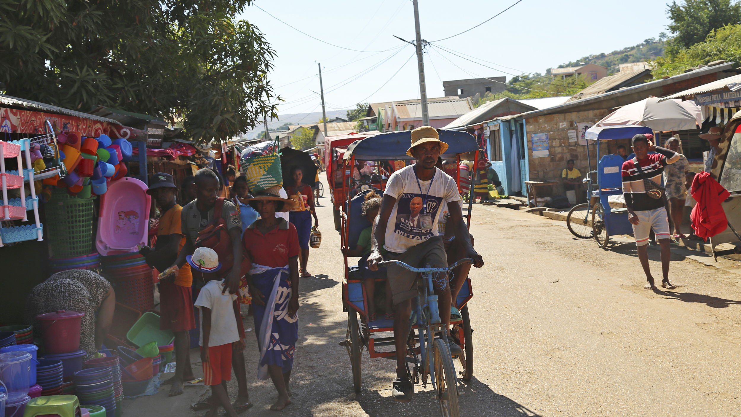 Markt und Rikschka-Fahrer