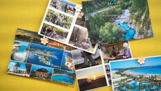 Auf dem Bild sieht man mehrere Ansichtskarten mit unterschiedlichen Motiven.