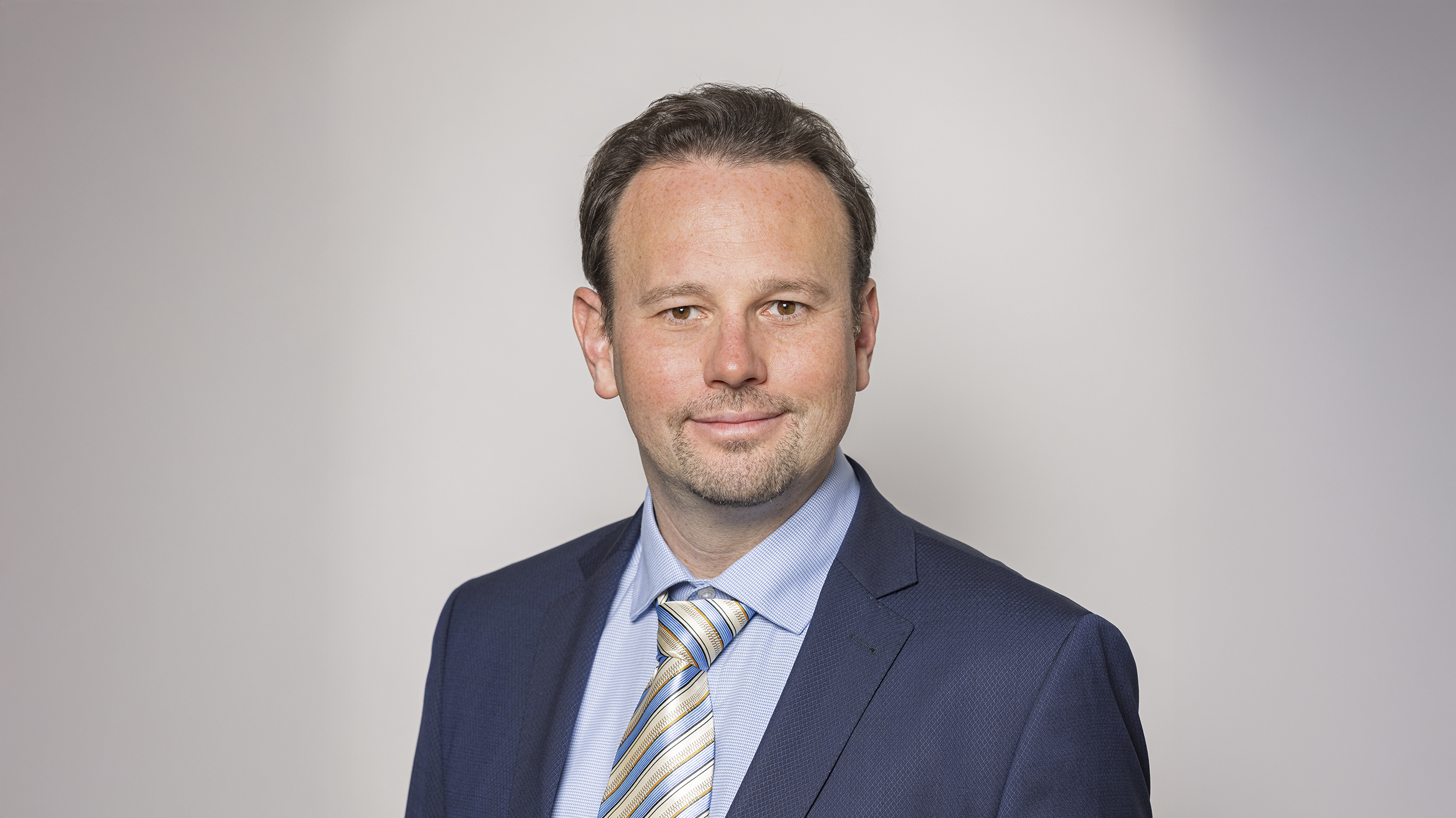 Porträtaufnahme von WIFO-Ökonom Klaus Friesenbichler