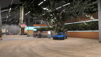 Screenshot aus Forza Horizon 6. Eine selbst designte Garage mit einem Sakura-Baum darin.