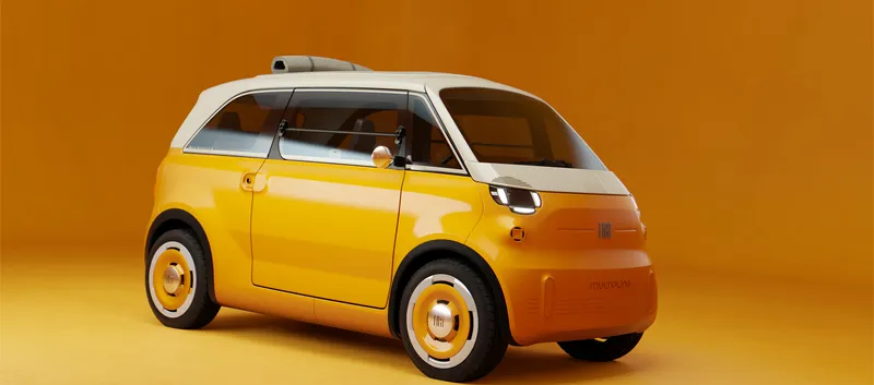 Orangefarbener Fiat Multiplina schräg von vorne mit weißem Dach, eingeschalteten Scheinwerfern, runden Außenspiegeln und einer grauen Rolle auf dem Dach.