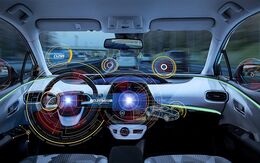 Auto-Cockpit. Mit Kreisen  - graphische Darstellung - wird auf verschiedene Assistenzsysteme  -Abstandswarner, Einparkassistent, u.a. - hingewiesen.