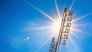Auf dem bild ist ein Thermometer angezeigt, das in die Sonne gehalten wird und eine hohe Temperatur von rund 35 Grad anzeigt.