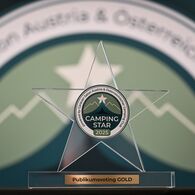 Camping Star 2025_(c)Messe Wels Das Foto zeigt den Camping Star Award, der sternförmig ist.