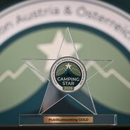Das Foto zeigt den Camping Star Award, der sternförmig ist. 