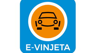 Ein Symbol für die elektronische Vignette (E-Vinjeta) in Slowenien. Der Hintergrund der Grafik ist hellblau, in der Mitte ein oranger Kreis mit einem gezeichneten Auto, unterhalb steht in weißer Schrift E-Vinjeta.
