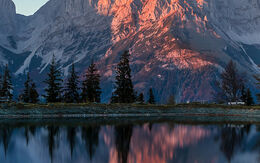 Sonnenuntergang über dem Wilden Kaiser Massiv iStock.com / Marco Martycz Photography