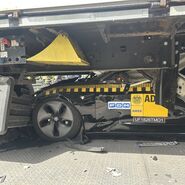 Bild eines Crashtest-Autos, das unter das Heck eines Lkw geraten ist
