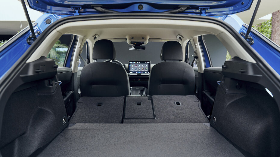 Kofferraum mit umgeklappten Rücksitzen eines VW T-Roc.
