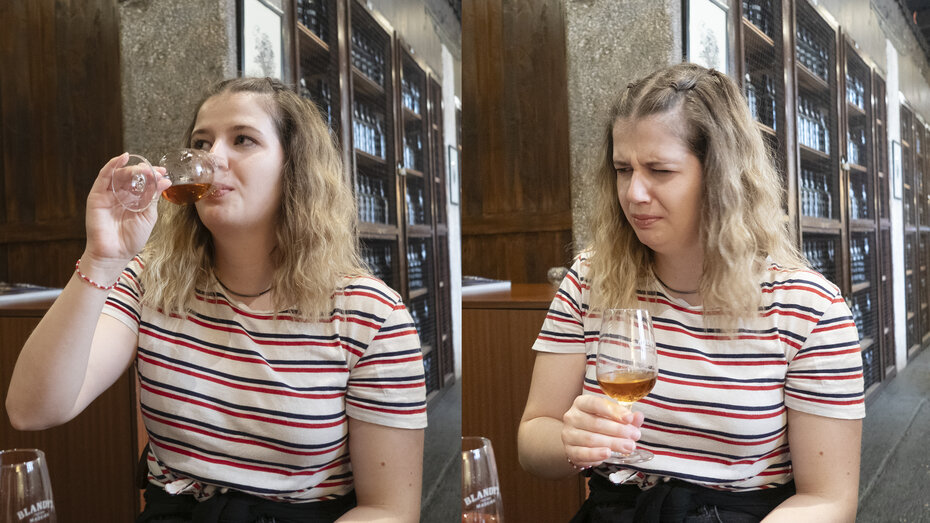Redakteurin Verena Schauer kostet Madeira Wein. Sie verzieht das Gesicht.