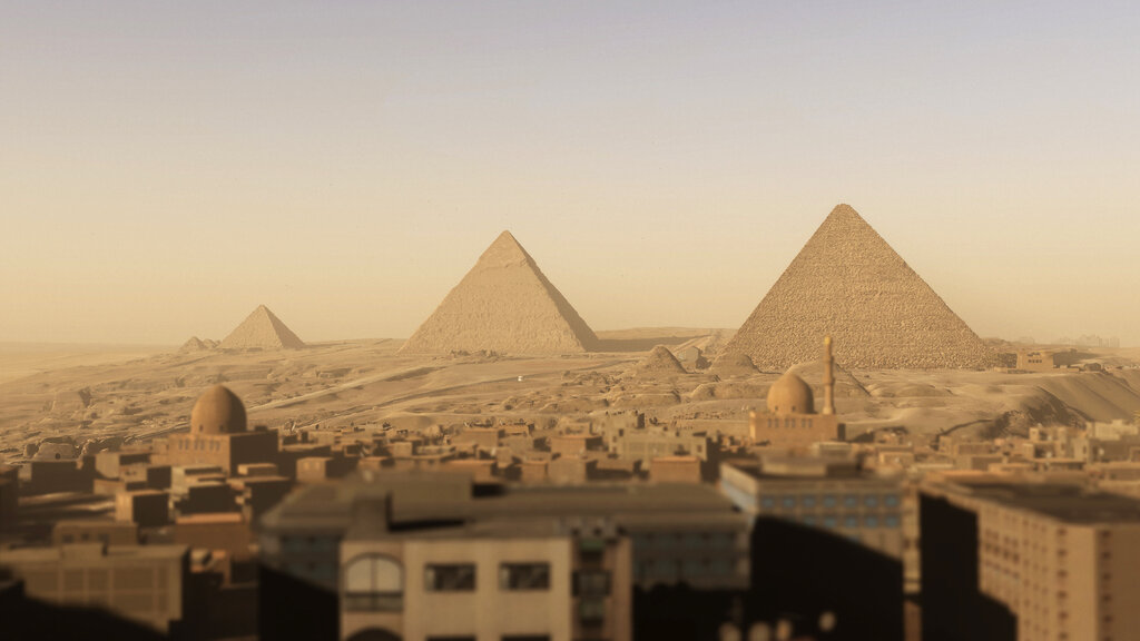 Immersives Erlbebnis im Donauturm zum Thema Cheops-Pyramide im alten Ägypten. Zu sehen: Landschaftsaufnahme mit den Pyramiden.