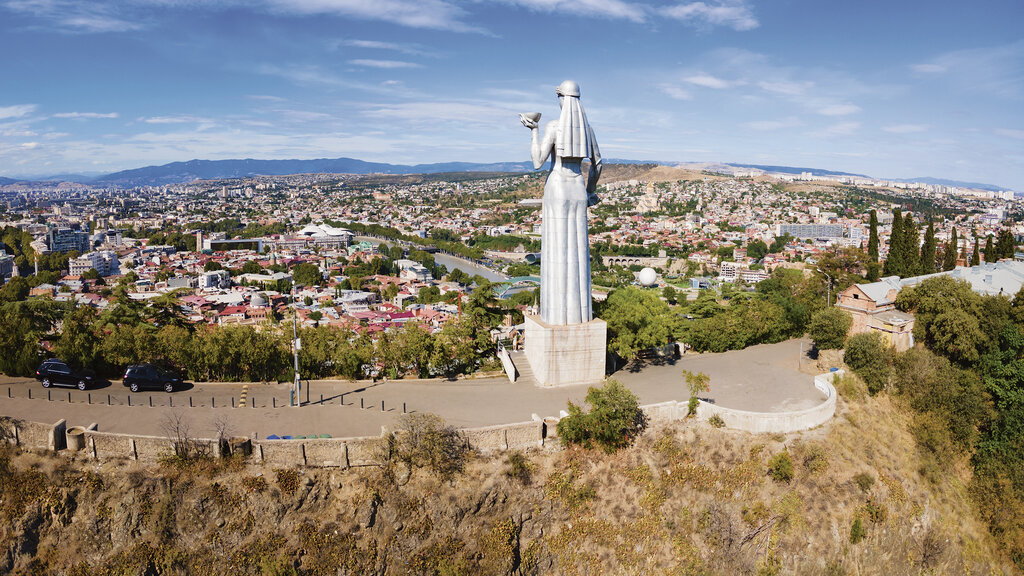 Tbilisi, Georgia - September 04, 2021: Kartlis Deda or Mother of Georgia monument aerial panoramic view in Tbilisi old town. Tbilisi is the capital and the largest city of Georgia.